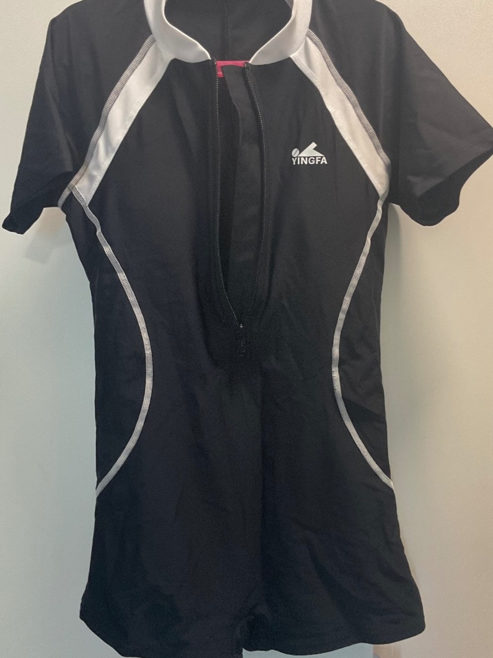 One piece black and white swimsuit , competition quality